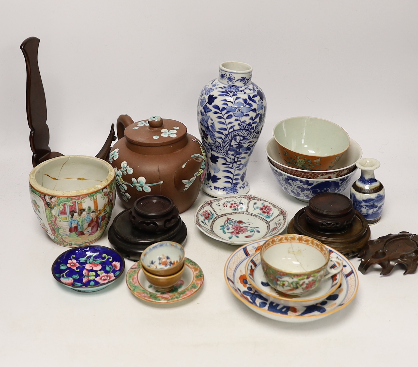 A collection of Chinese vases, pots and carved hardwood stands (18)